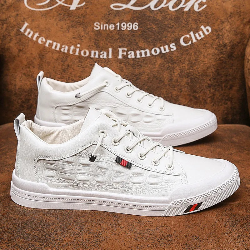 White men's lace-up casual sneakers with round toe and flat rubber sole.