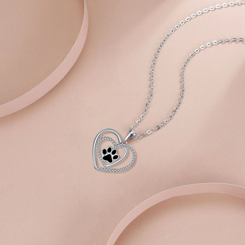 Women's silver tone dog paw prints heart necklace with copper pendant and cross chain