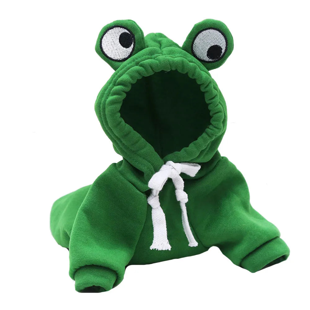 Green frog costume hoodie worn by a small dog, showing soft fabric and hood.