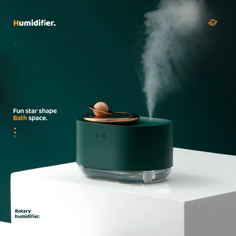 Green rotating planet-shaped USB humidifier with night light on a car dashboard