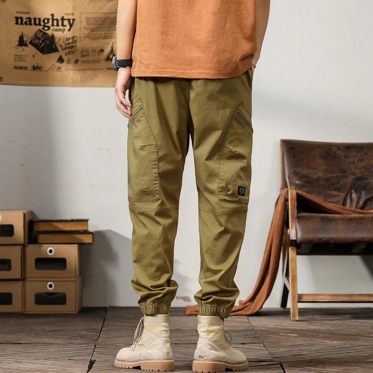 Men's khaki coloured loose fit cotton harem pants with a tapered ankle band.