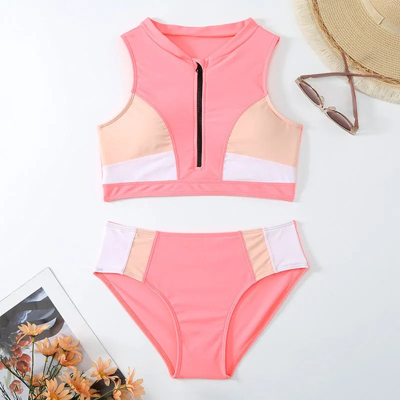 Pink high waist bikini set with split briefs design on a mannequin.