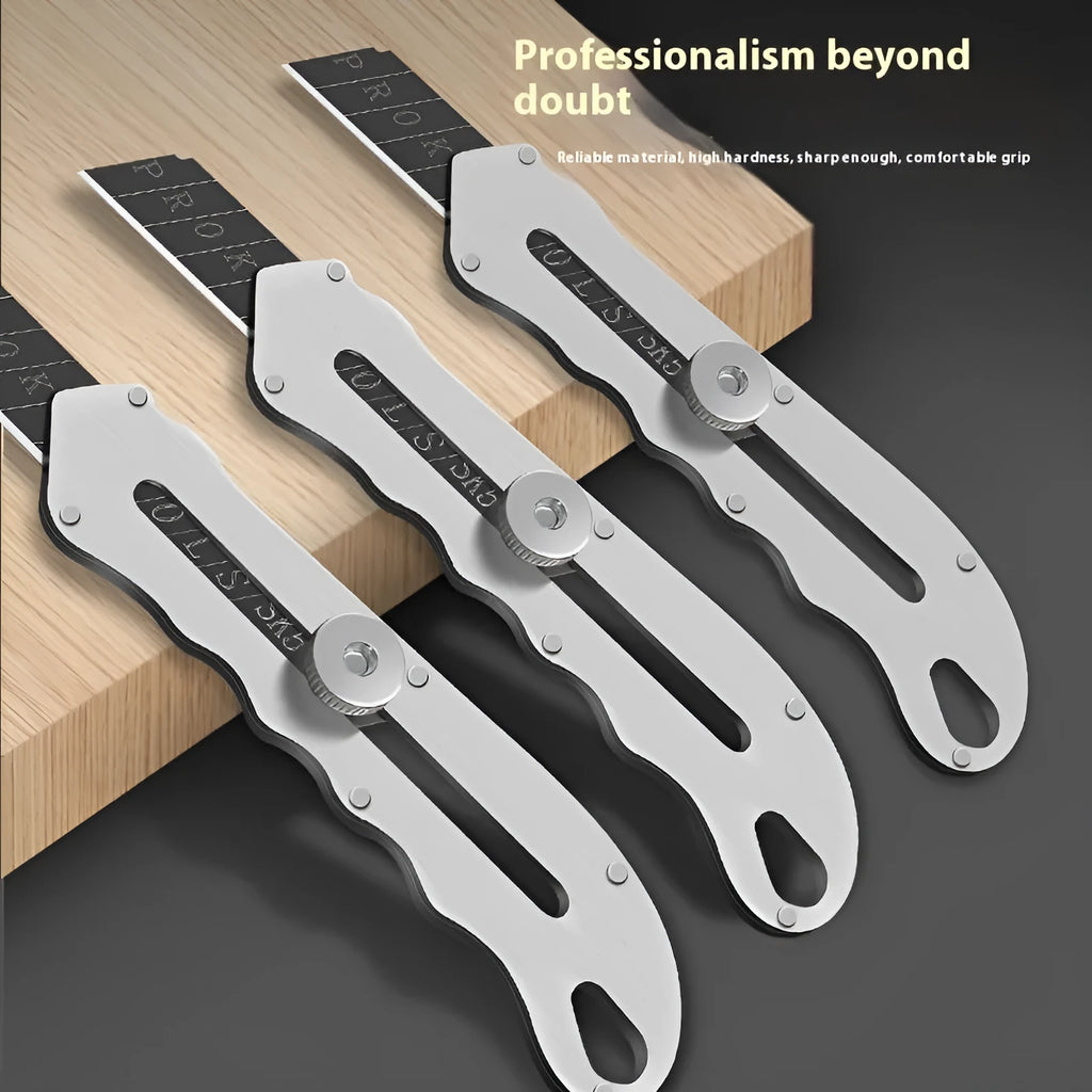 Stainless steel folding art knife with black blade alongside long and trapezoidal blades.