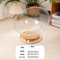 Transparent acrylic cat space capsule bed with turntable base on floor