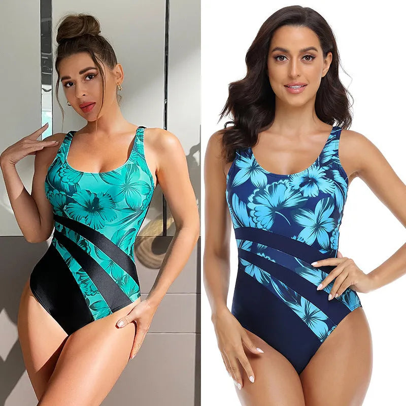 Women's blue printed one-piece swimsuit with conservative briefs design on mannequin