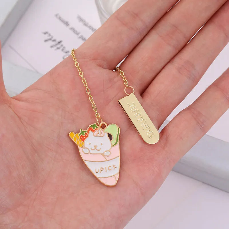 Metal bookmark pendant with a cartoon cat design, options include strawberry cake cat and sleeping cat styles.