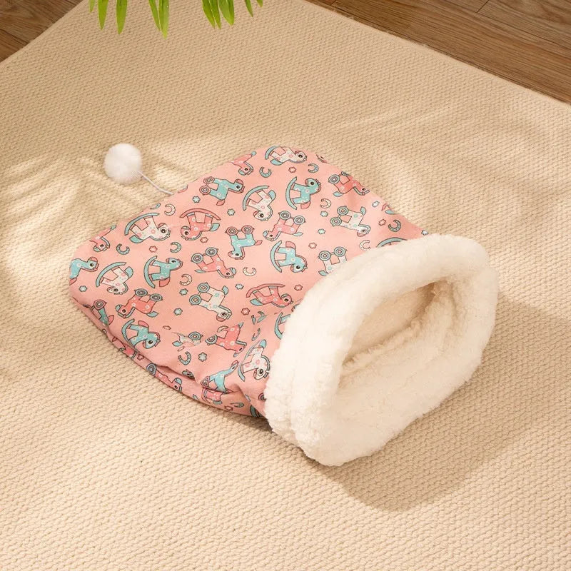 Blue rabbit patterned flannel cat sleeping bag nest measuring 50 by 40 centimetres.
