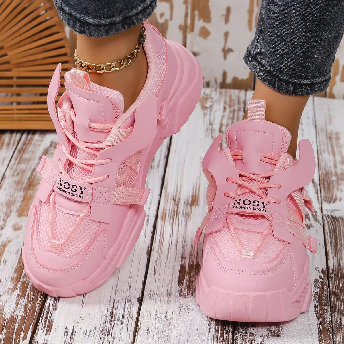 Women's purple platform mesh sneakers with lace-up front on wooden floor