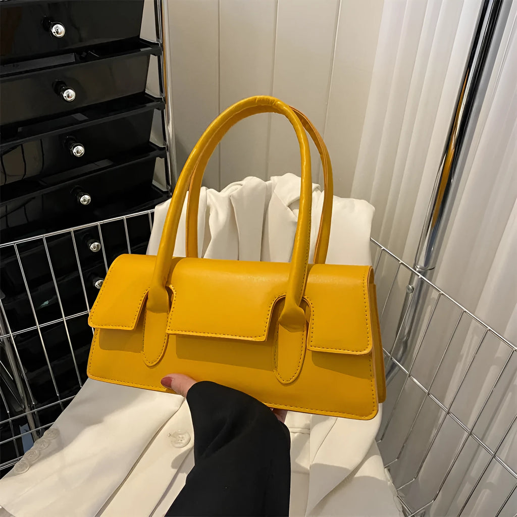 Women's black PU leather square handbag with single shoulder strap and stitching detail