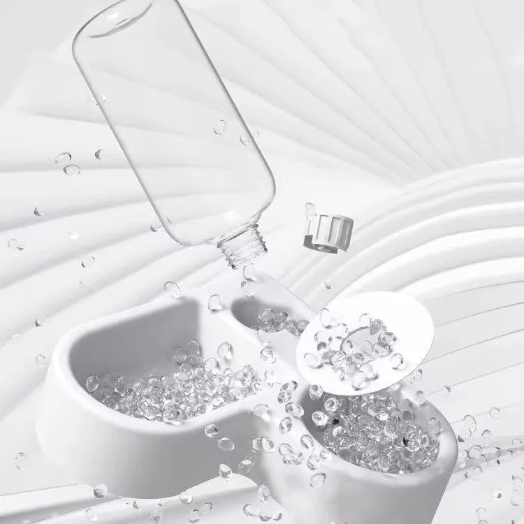 White cat water fountain with stainless steel top for indoor use.