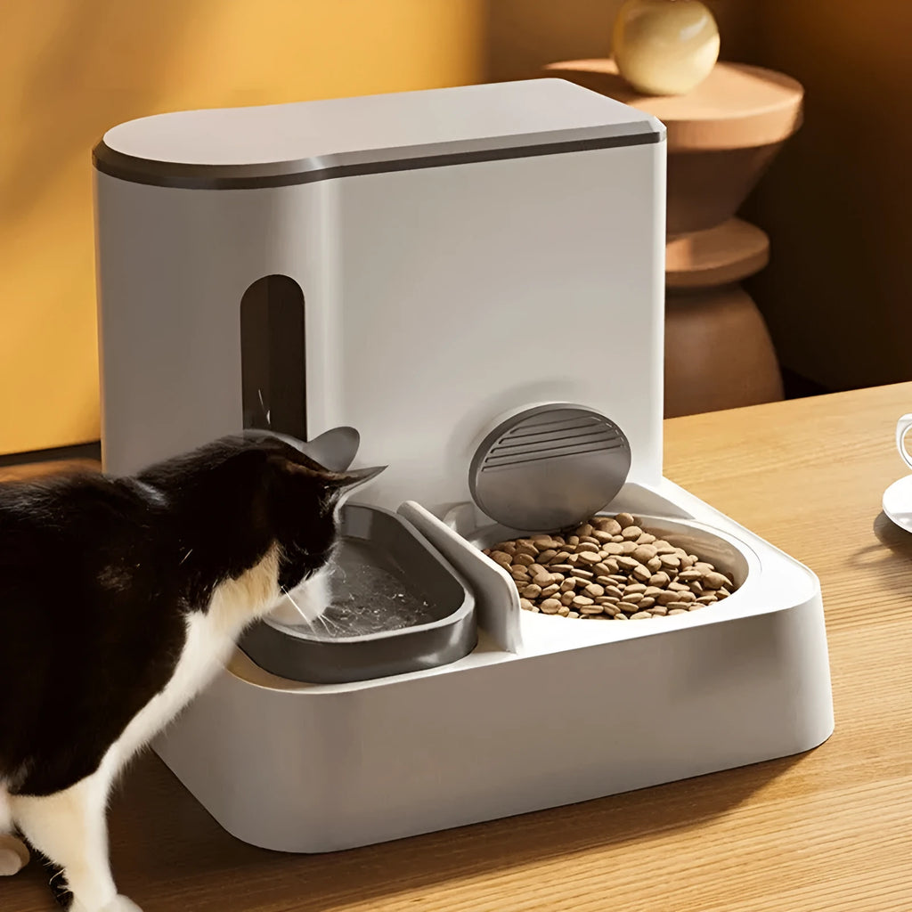 Grey automatic cat feeder and water dispenser unit with two bowls.