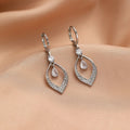 Women's copper water drop tassel earrings with zircon accents and thickened gold ear buckles