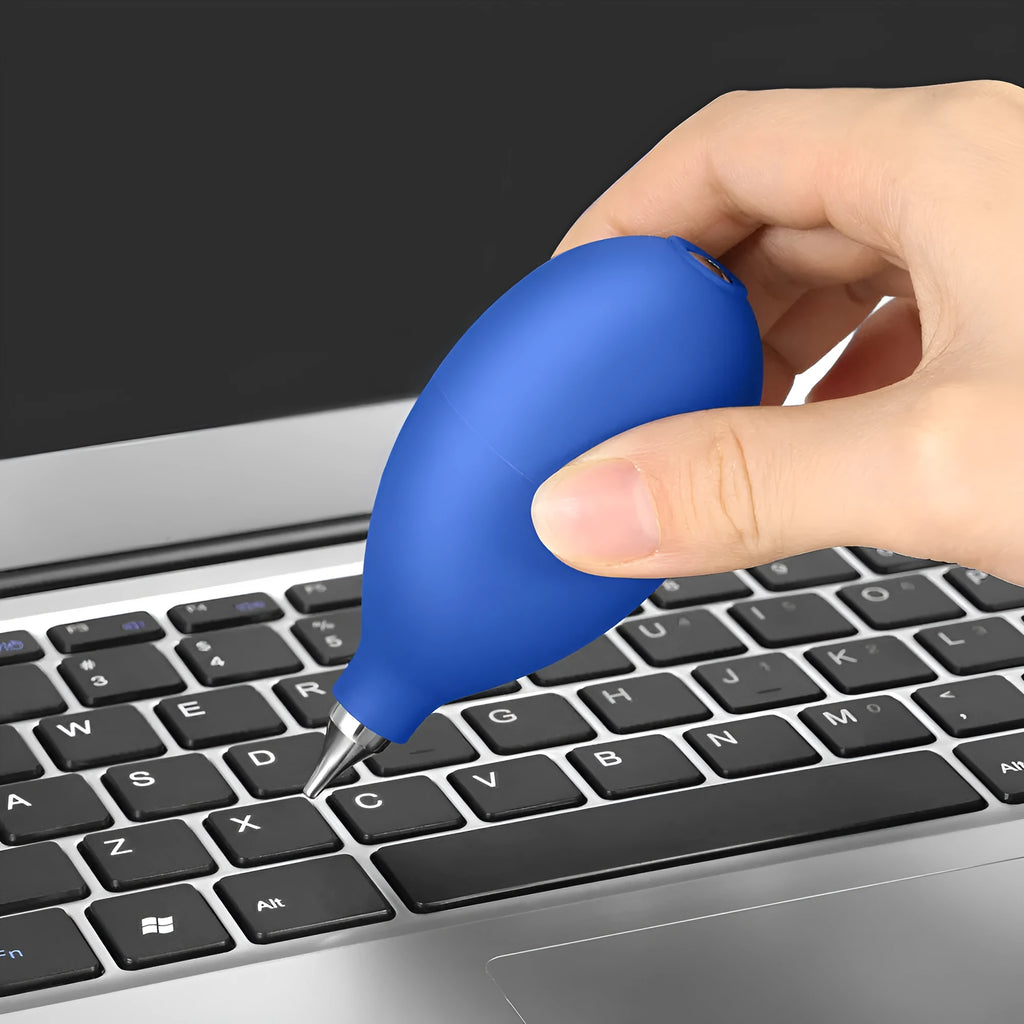 Blue rubber manual dust removal blower for cleaning cameras and mobile phones.