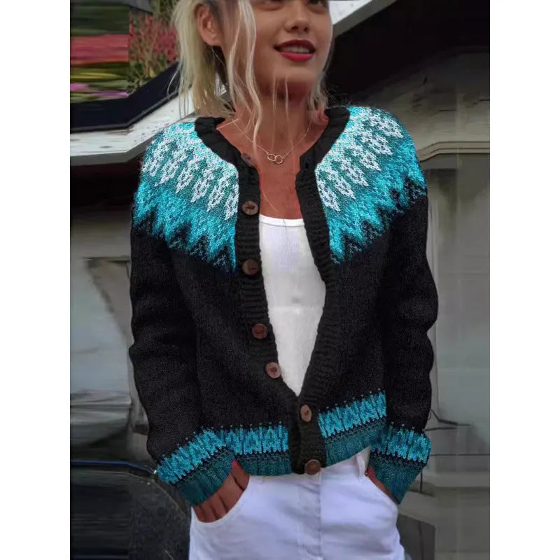 Yellow cardigan coat with a raised 3D pattern, shown on a hanger.