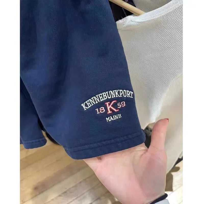 Women's cotton sports shorts with white flag embroidery in dark blue colour