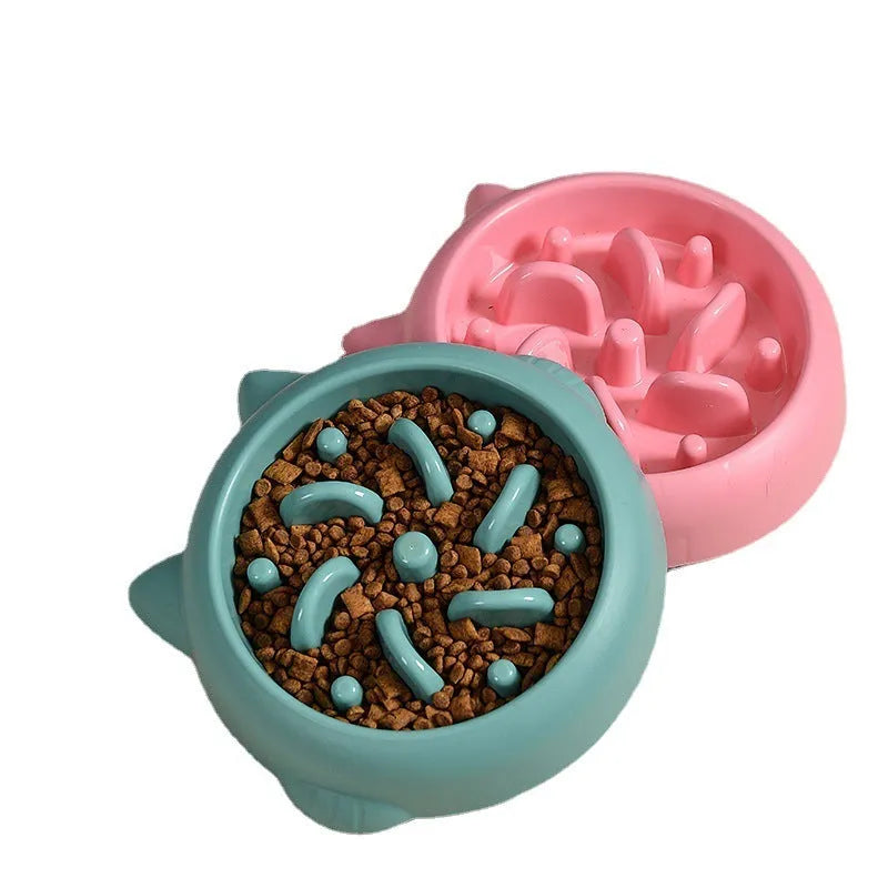 Green bone-shaped slow feeder bowl for dogs with raised interior ridges