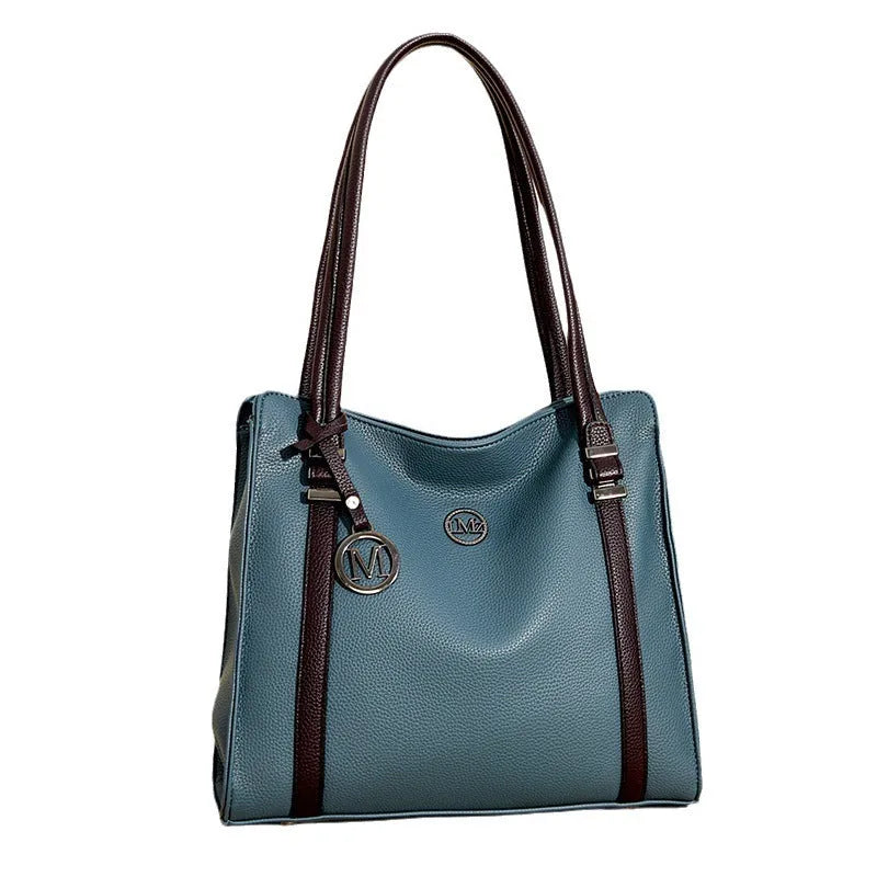 Genuine leather women's crossbody bag in retro style showing horizontal square shape and double shoulder straps.