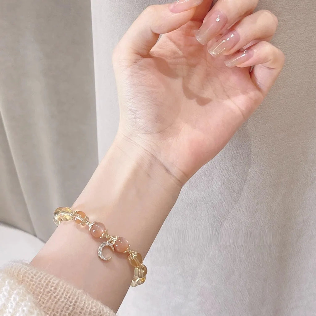 Women's Chinese style crystal bracelet with 14K gilded electroplating and diamond shaped beads
