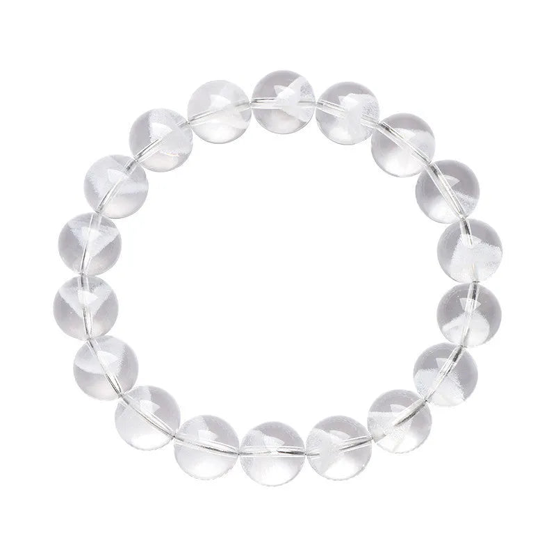 Women's original design white crystal pyramid bracelet with Ruyi charm on wrist.