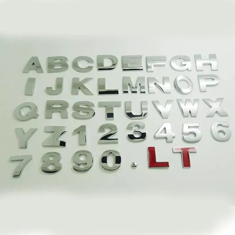 Metal zinc alloy car bumper sticker showing 2.5cm English letter on black background