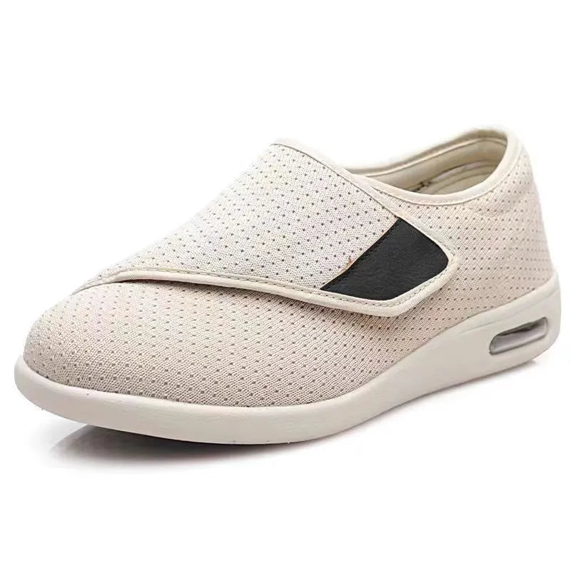 Leisure shoes for elderly with Velcro strap, textile and synthetic leather upper, round toe.