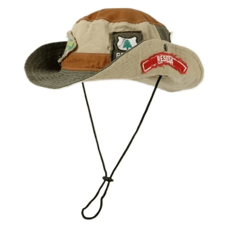 Army green women's foldable cotton fisherman hat with retro patchwork design and flat crown.