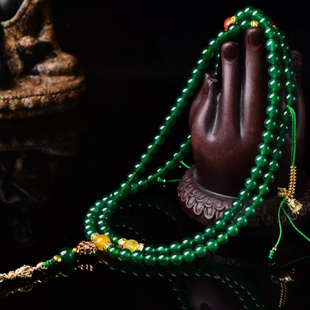 Brazilian green agate multi-strand bracelet showing different bead sizes on a wrist.