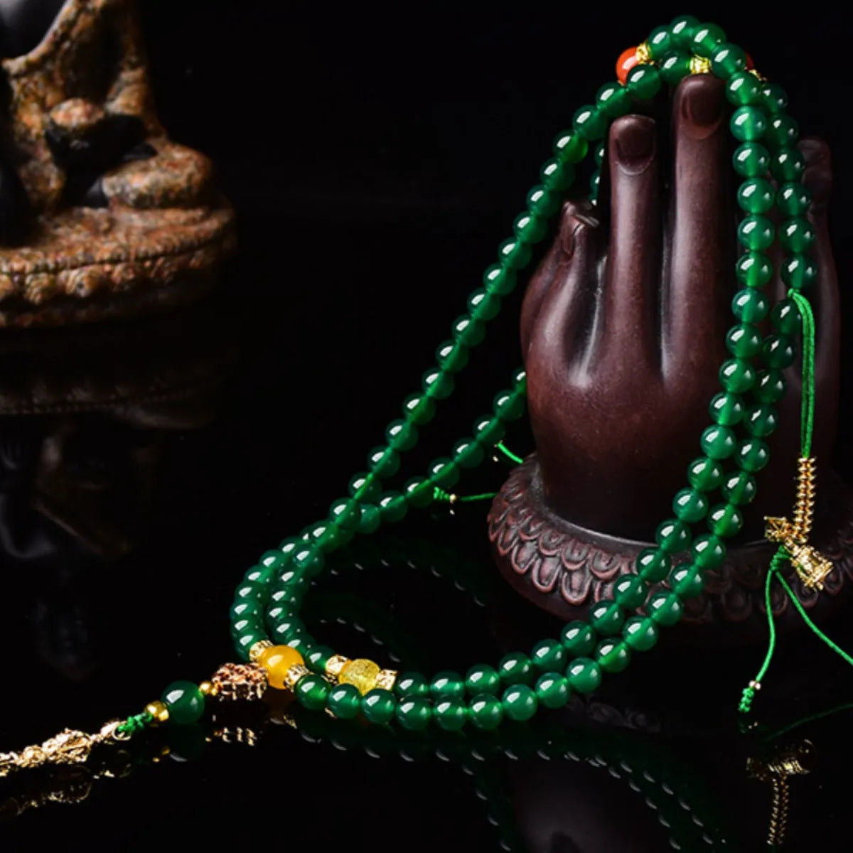 Brazilian green agate multi-strand bracelet showing different bead sizes on a wrist.