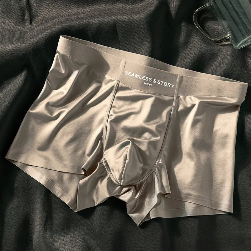 Men's solid colour Ice Silk boxer shorts with mid waist, shown in coffee, light grey, white, and blue.
