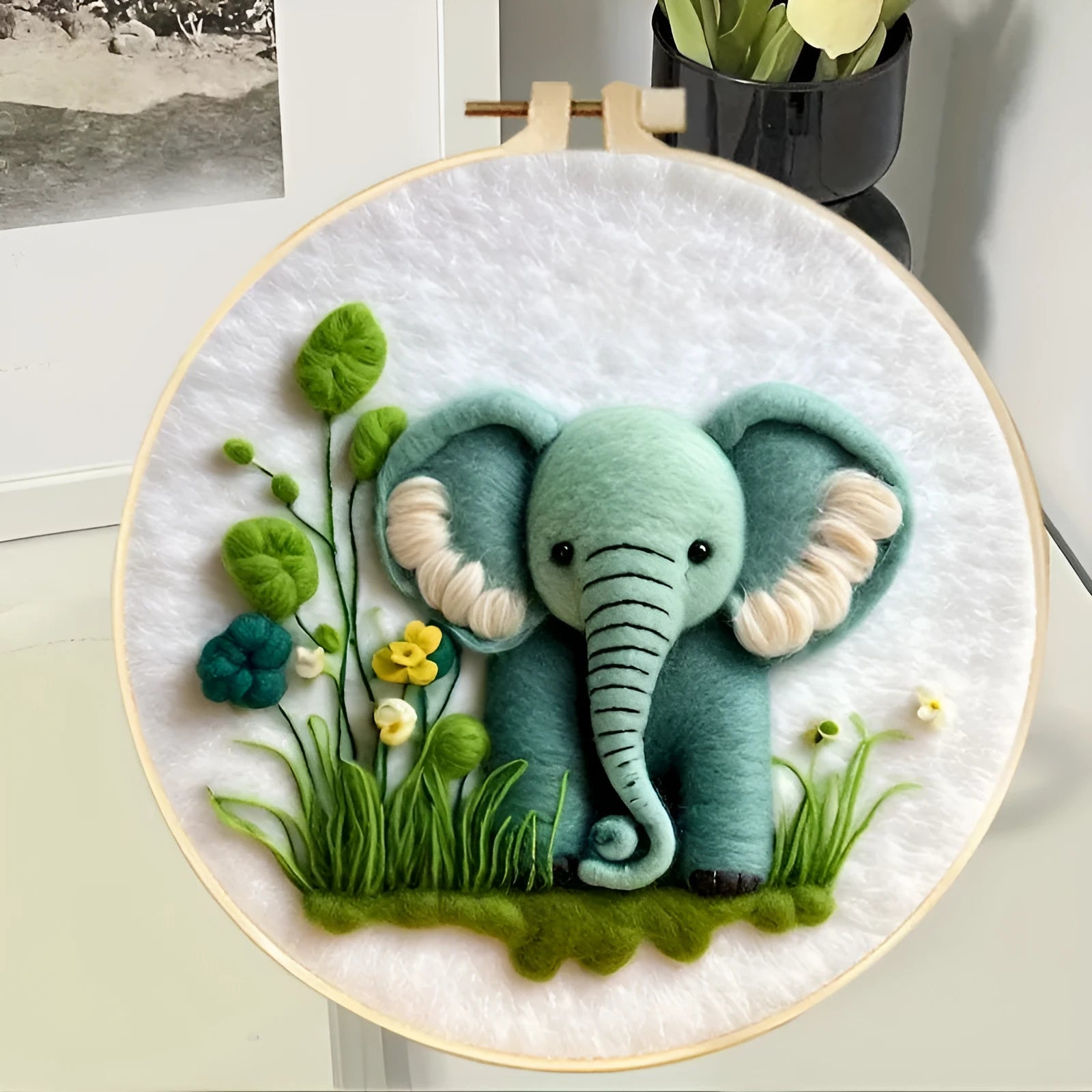 Round linen fabric embroidery kit with wool felt pieces for making a three-dimensional floral blanket painting, includes a free frame.