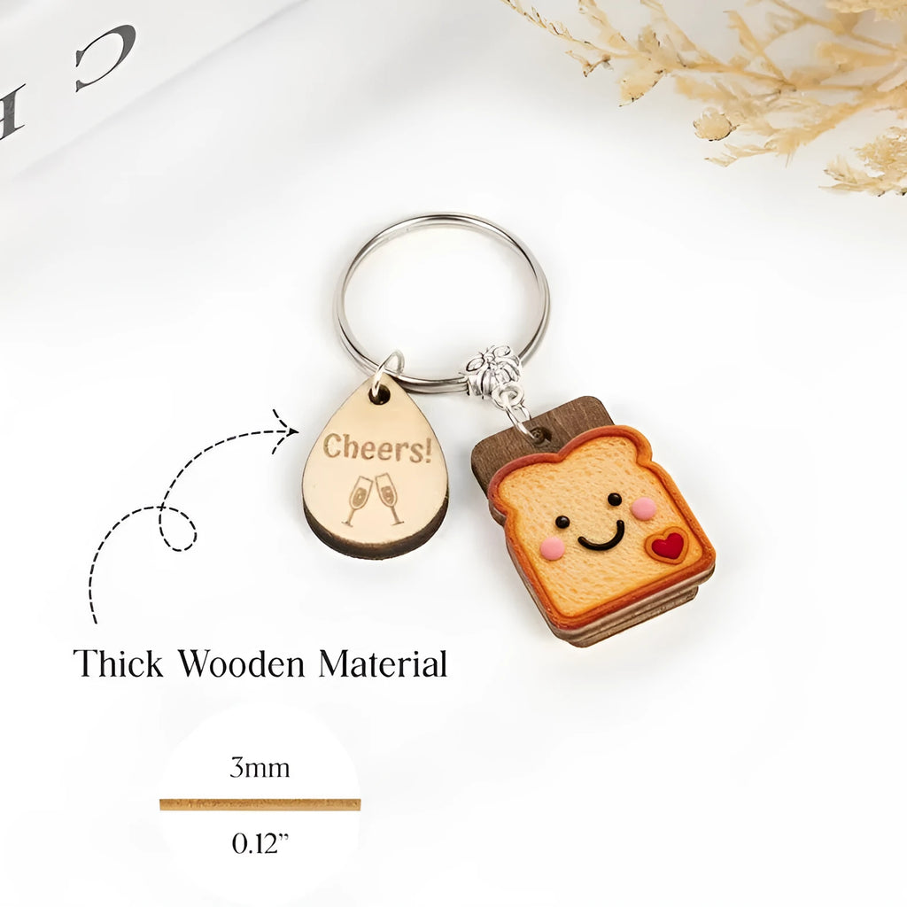 Cute bread wooden board water drop pendant alloy key ring with toast design on white background