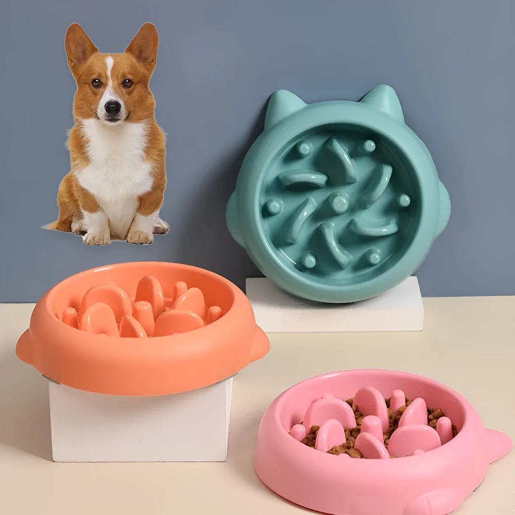 Green bone-shaped slow feeder bowl for dogs with raised interior ridges