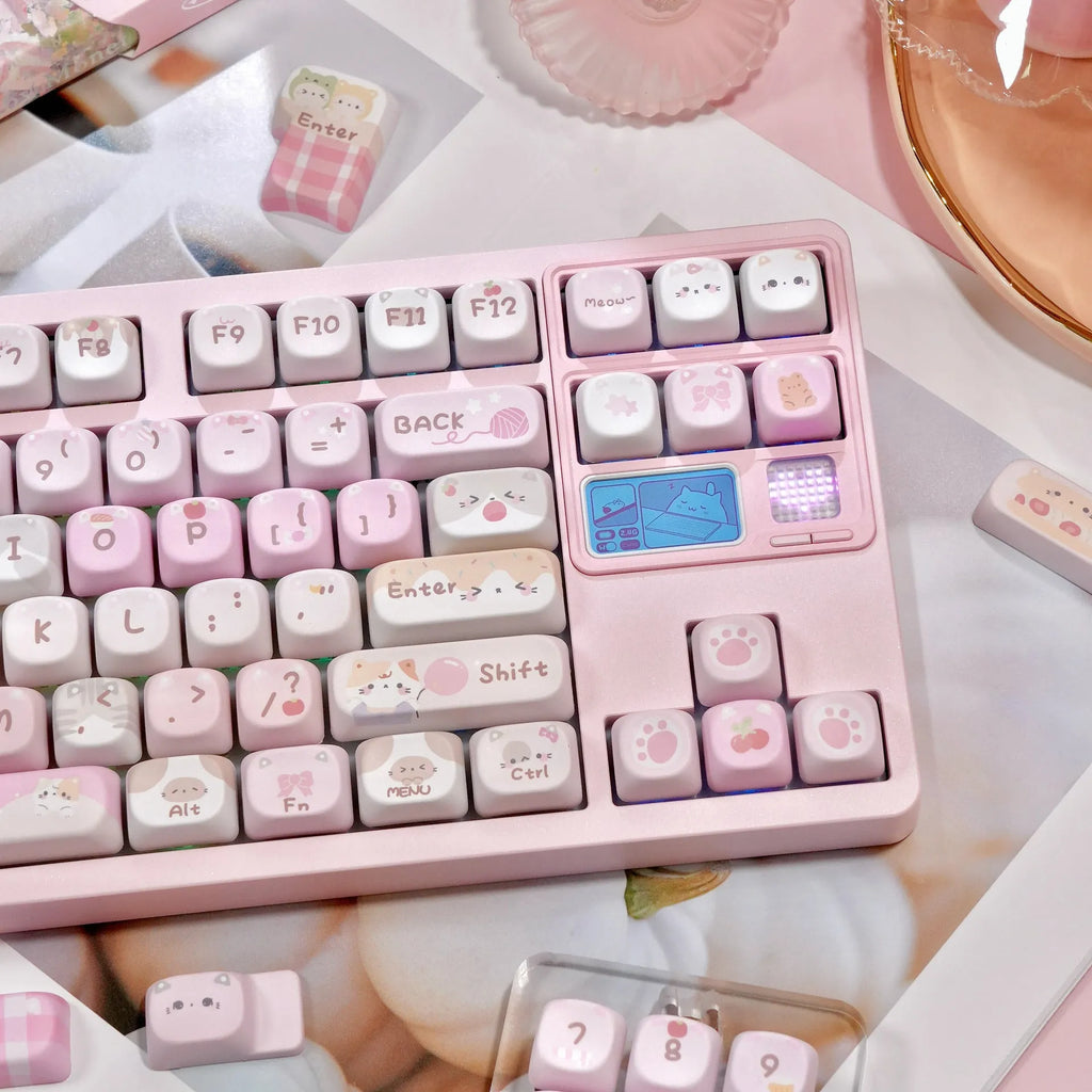 Set of pink cartoon character keycaps for mechanical keyboards with design on all sides.