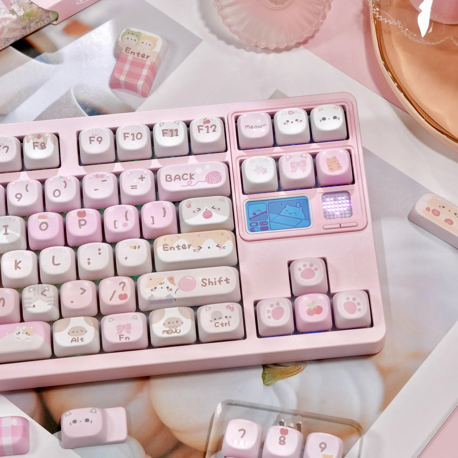Set of pink cartoon character keycaps for mechanical keyboards with design on all sides.
