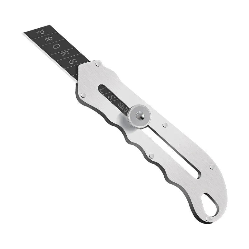 Stainless steel folding art knife with black blade alongside long and trapezoidal blades.