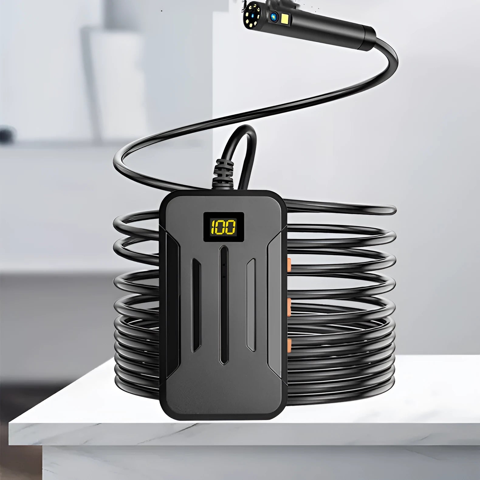 F300 wireless dual lens endoscope with IP68 waterproof rating and 20-metre cable next to hook and magnet accessories.
