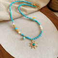 Freshwater pearl necklace with stone sun pendant in French royal court style, blue sun colour option