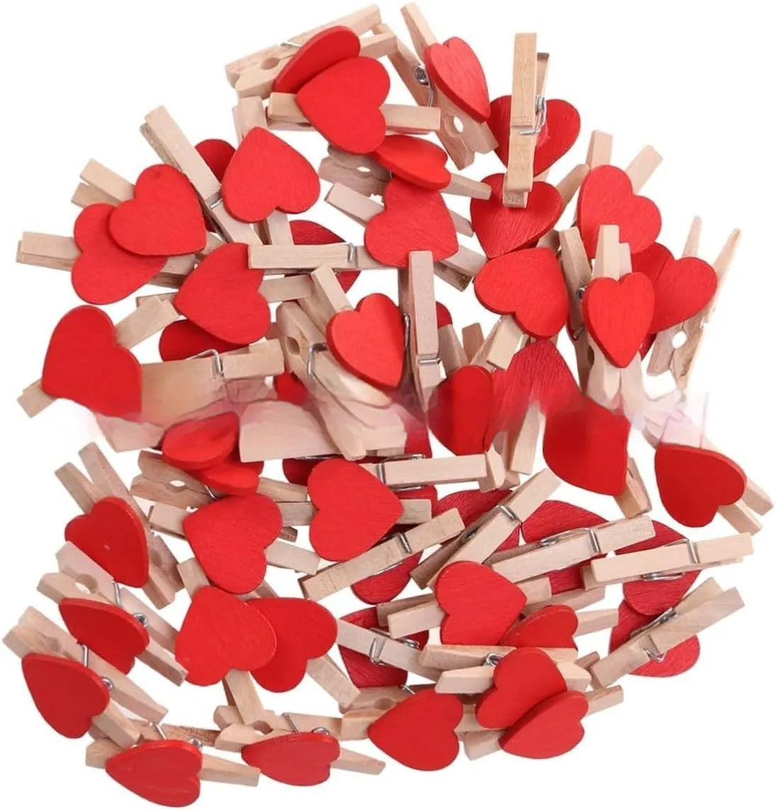 Set of five handmade solid wood heart-shaped clips in red, pink, white, and yellow on a wooden surface.