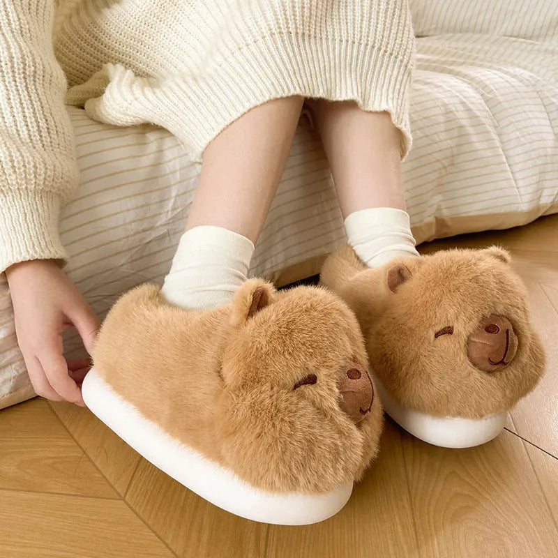 Light brown women's winter plush slippers with artificial wool lining and PVC sole