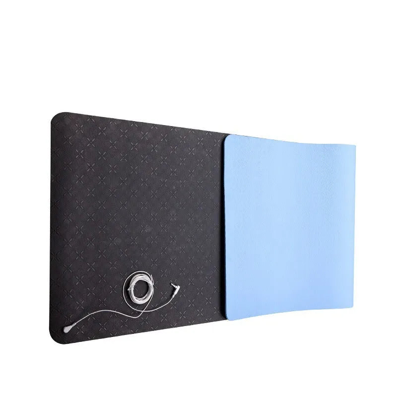 Blue conductive yoga mat with plant pattern and grounding wire, dimensions 182cm by 61cm.