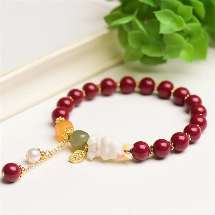 Traditional Chinese cinnabar bracelet with rabbit charm in 8mm or 10mm bead sizes