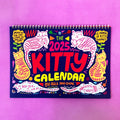Cat-themed wall calendar planner showing monthly grids, available for 2024 and 2025