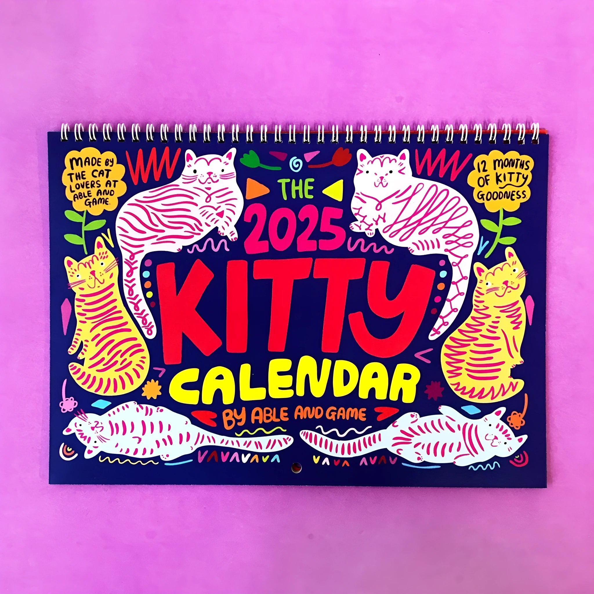 Cat-themed wall calendar planner showing monthly grids, available for 2024 and 2025