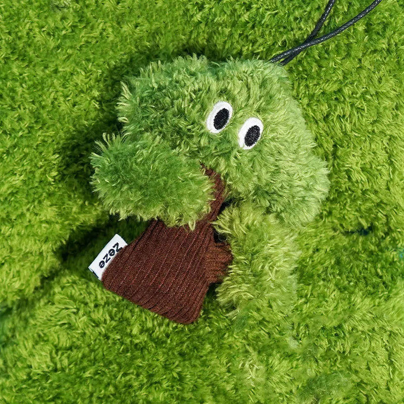 Pine tree-shaped cat mint toy bag pendant and a separate cat tease stick on a white background