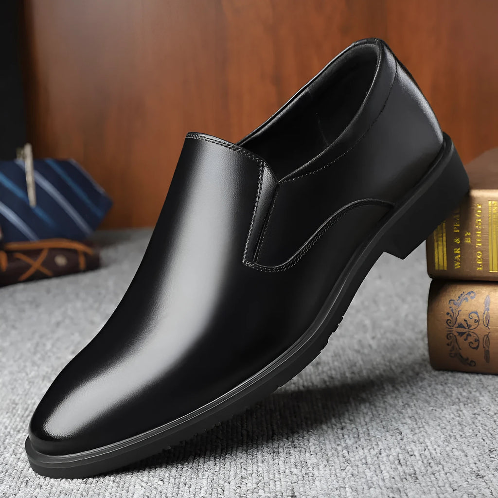 Men's black renewable leather business casual slip-on shoes with rubber sole and leather toe cap.