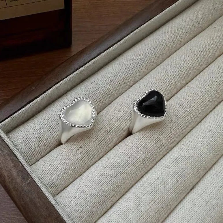 Adjustable sterling silver ring with black agate heart centrepiece