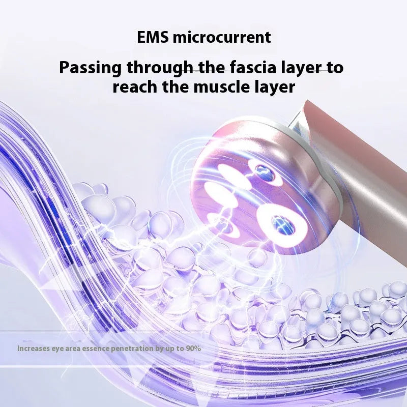 Gradient pink Cat's Paw micro-current eye massager with charging cable.