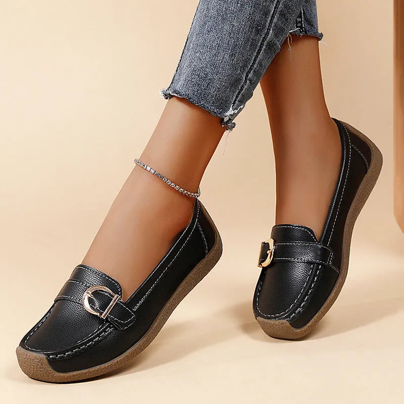Women's beige casual slip-on loafers with a round toe and flat beef tendon sole.