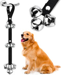 Silver metal dog training doorbell with 7 bells on an adjustable nylon leash hanging on a door