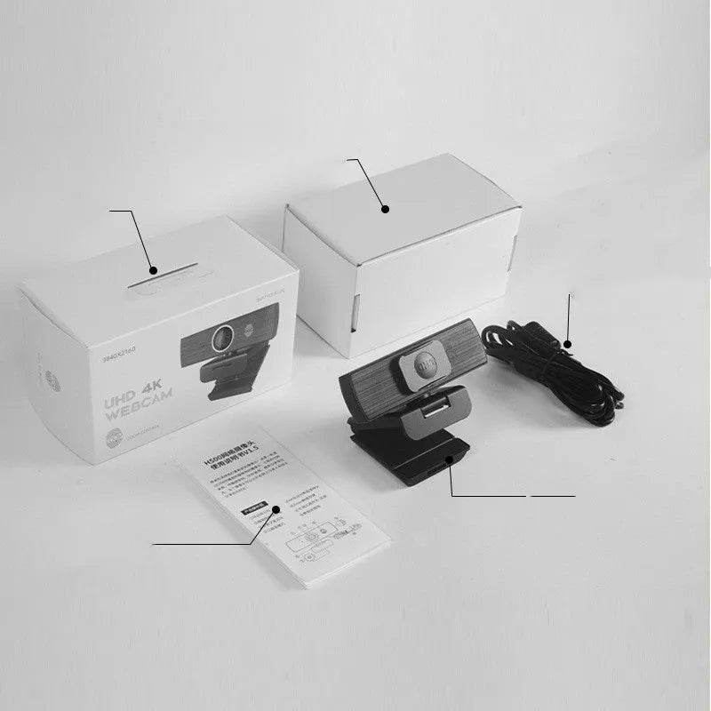 Black USB webcam with magnetic privacy cover shown alongside 1.7 metre cable for video conferencing